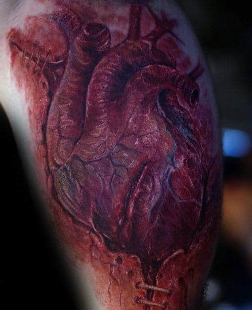 cool-realistic-mens-arm-torn-skin-heart-tattoo