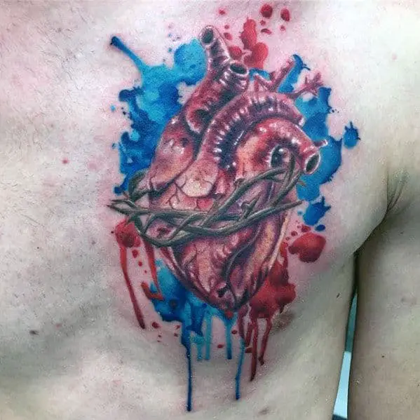 crown-of-thorns-with-heart-watercolor-guys-realistic-chest-tattoo