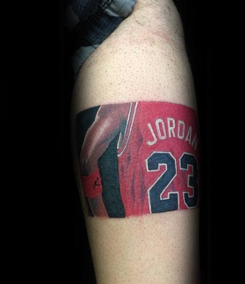 forearm-band-mens-jordan-themed-tattoo-on-leg