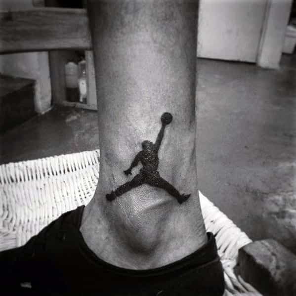 mens-black-ink-jordan-symbol-tattoo-on-ankle-of-leg